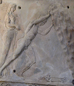 Terracotta plaque with relief of Theseus with mother Aethra, lifting rock to discover sandal and sword left by his father. Roman, first century BCE – first century CE. From Cerveteri. London, British Museum. Photo by Barbara McManus, 1999