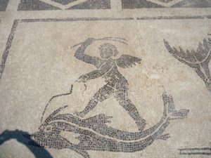 Palaemon riding a dolphin. Mosaic. Mid 2nd century CE. Roman bath. Isthmia.