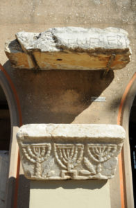 Menorahs and an inscription from the Jewish synagogue in Corinth