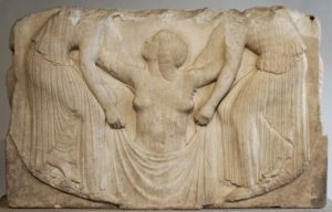 Aphrodite attended by two handmaidens as she rises out of the surf