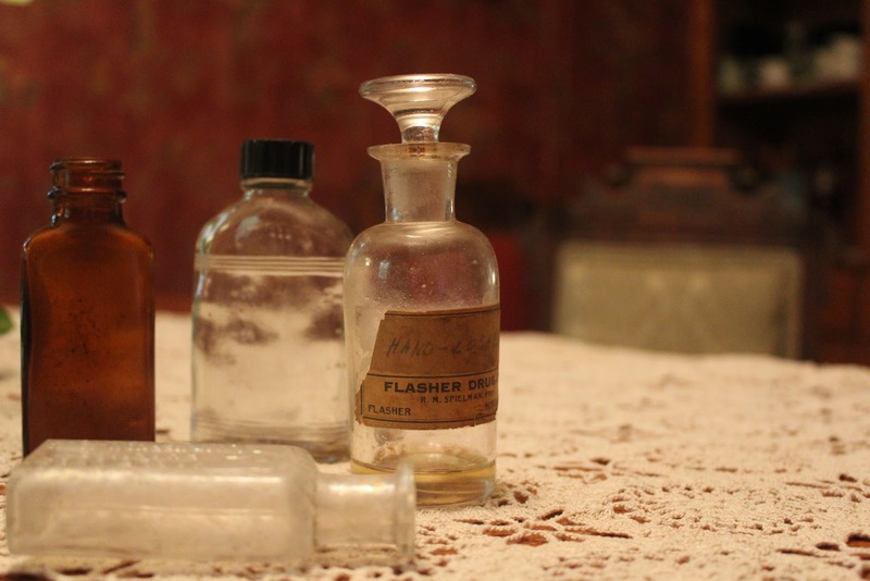 Old medicine bottles found in cistern at 617 7th Ave NW